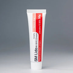 SM CREAM 30G - SM CREAM 30G is a compact, lidocaine-based numbing cream designed to reduce pain and sensitivity in localized areas. With 10.56% lidocaine, it provides effective, long-lasting numbing for smaller cosmetic and dermatological treatments, ideal for single-use applications.